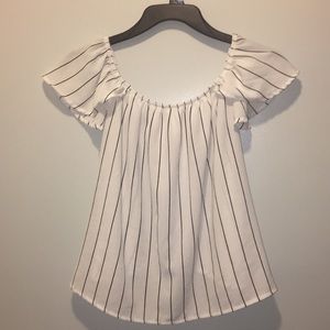 Cute top with opening on the back side!